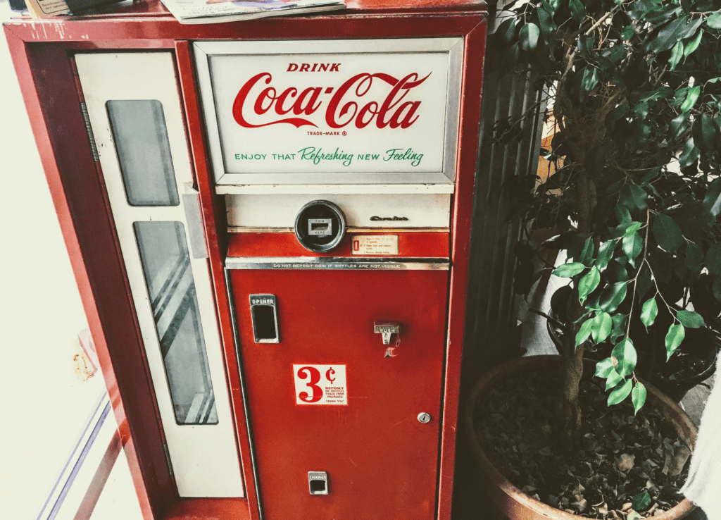 photo of an cold coca-cola vending machine